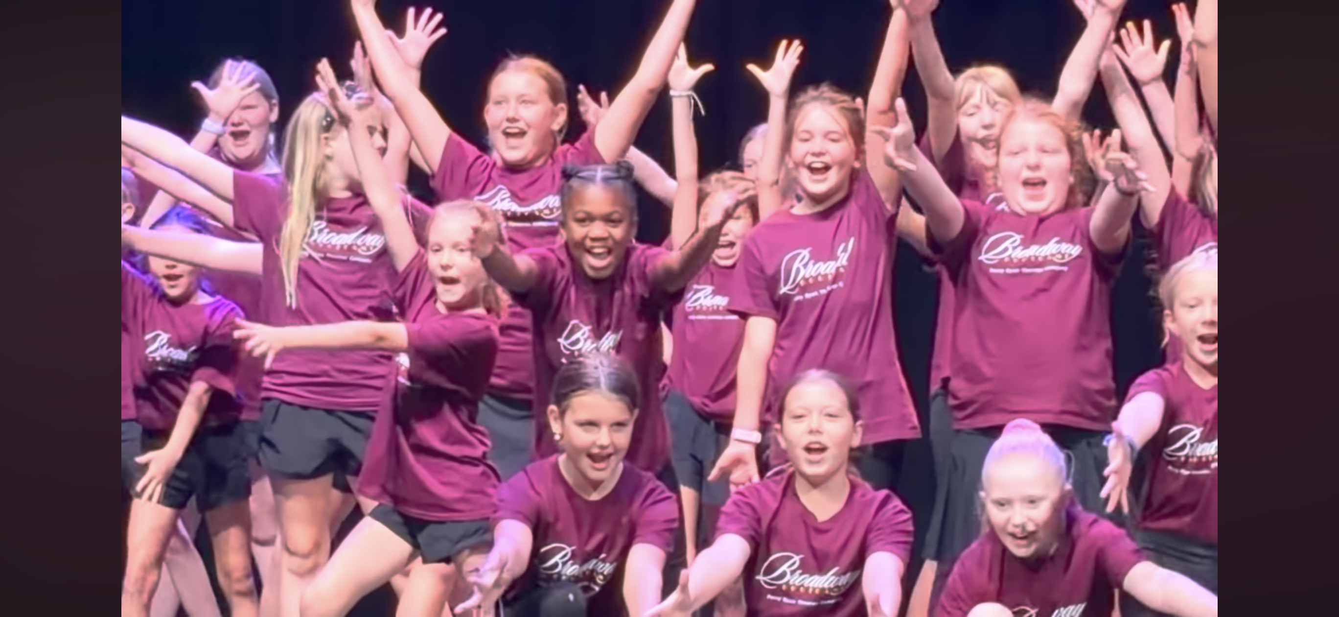 Kennedy performing on stage during Boot Camp theatre Performance