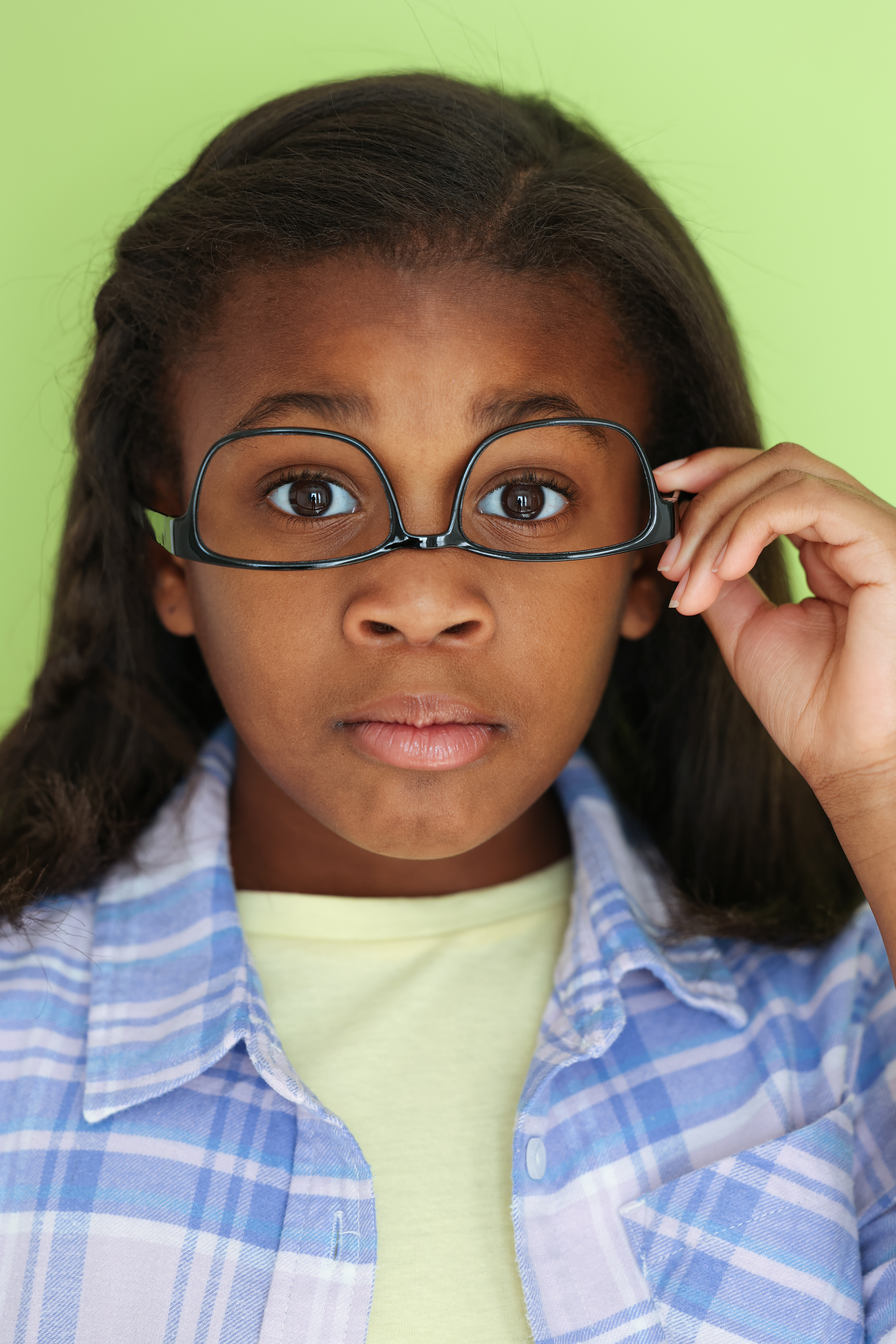 Kennedy expressive headshot with glasses