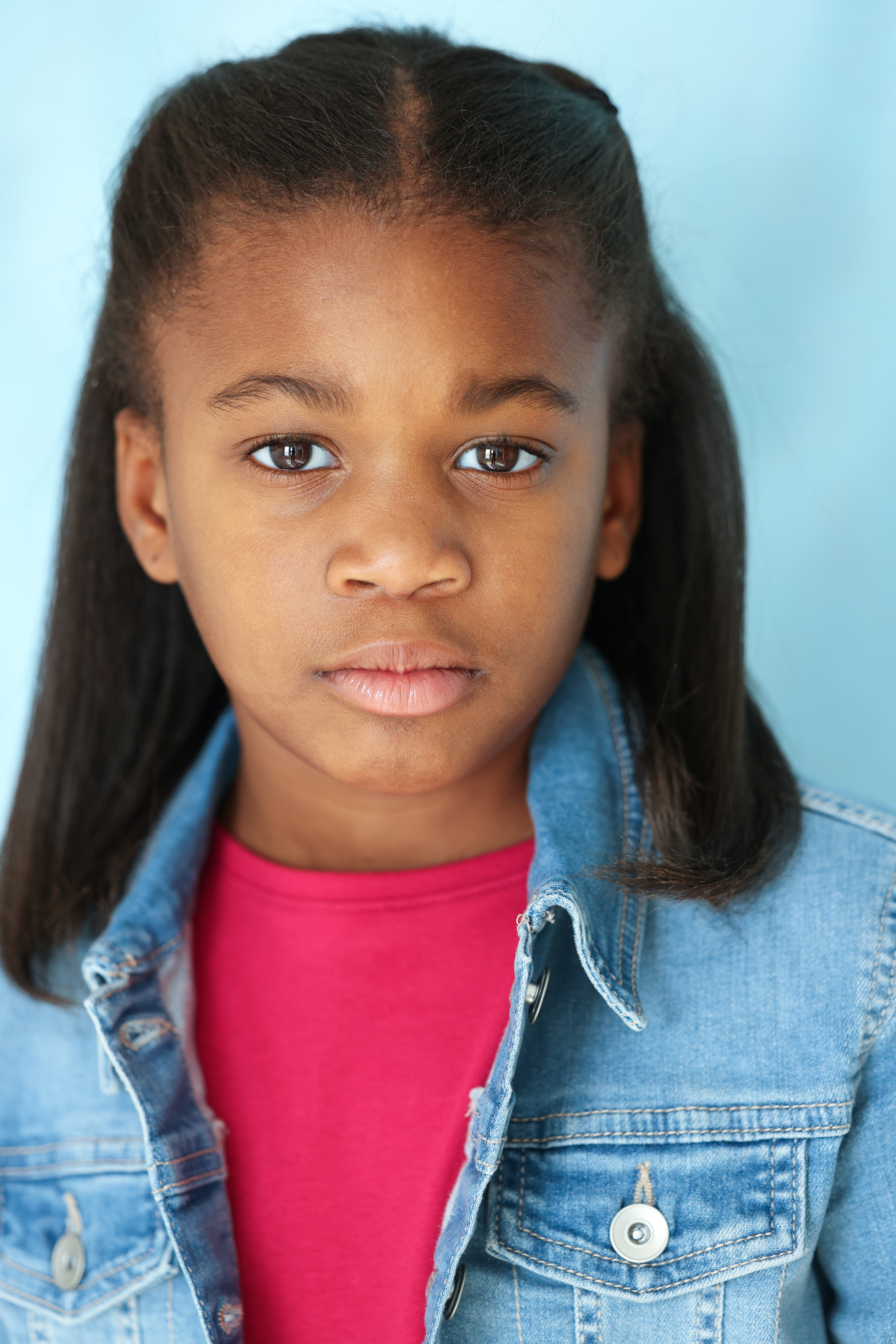 Kennedy focused studio headshot