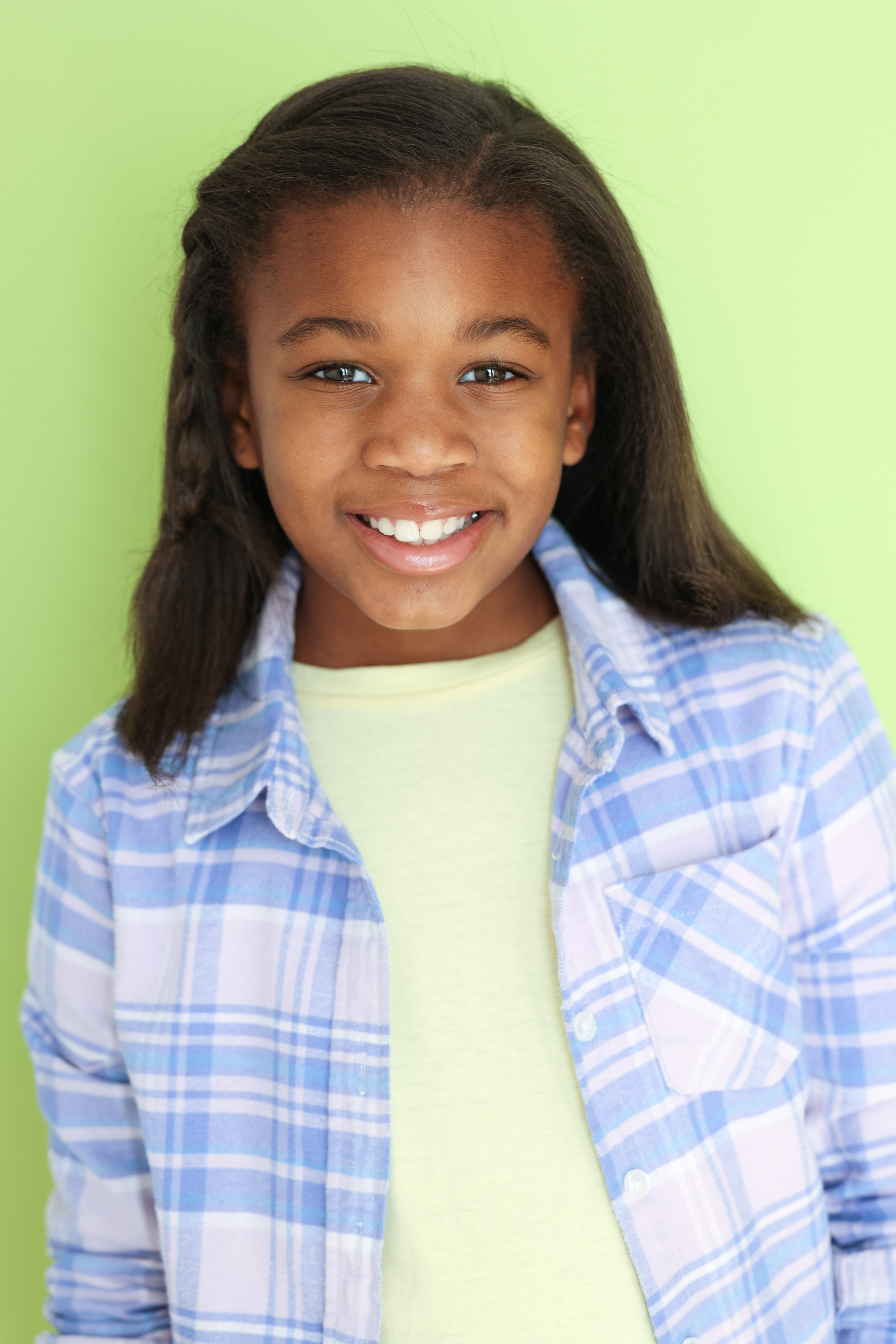Approved smiling headshot for Kennedy's acting portfolio